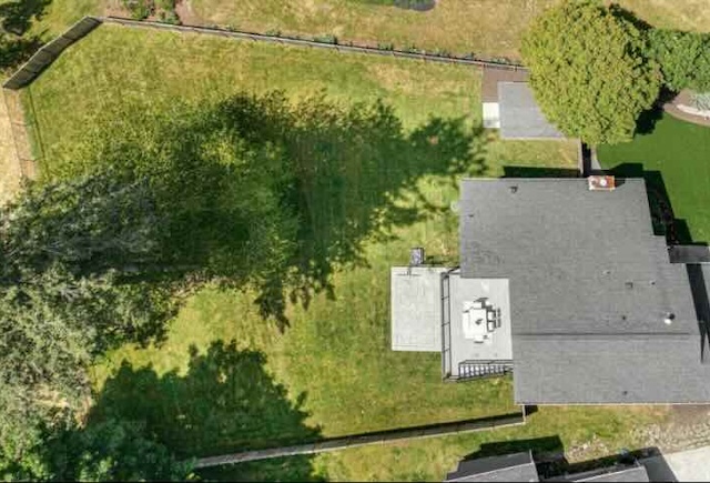 Aerial view of the half-acre property and yard