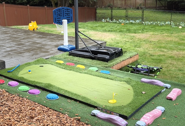 Lawn games area in the backyard